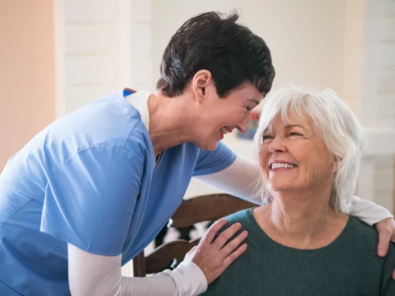  Nurse taking care of elderly lady